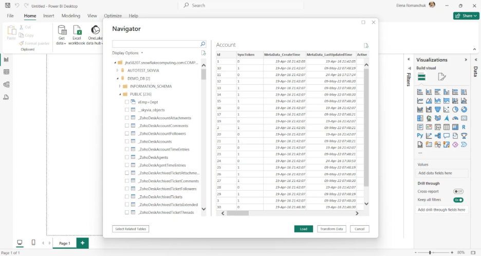 Browsing Snowflake Tables in Power BI Desktop's Navigator Window Screenshot of Power BI Desktop's Navigator dialog showing a connected Snowflake database with the DEMO_DB schema expanded